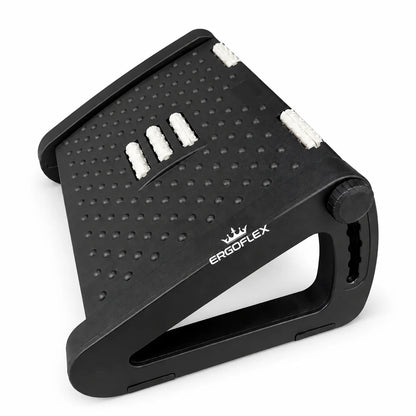 ErgoFlex black adjustable footrest with crown logo on its side frame, angled view on white